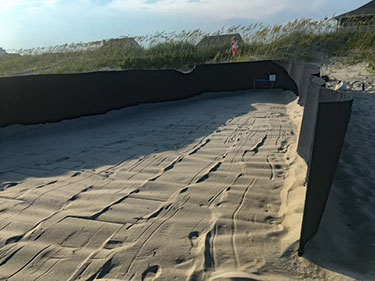 Shade cloth around nest erected by volunteers to shield hatchlings from disorienting light pollution inland.