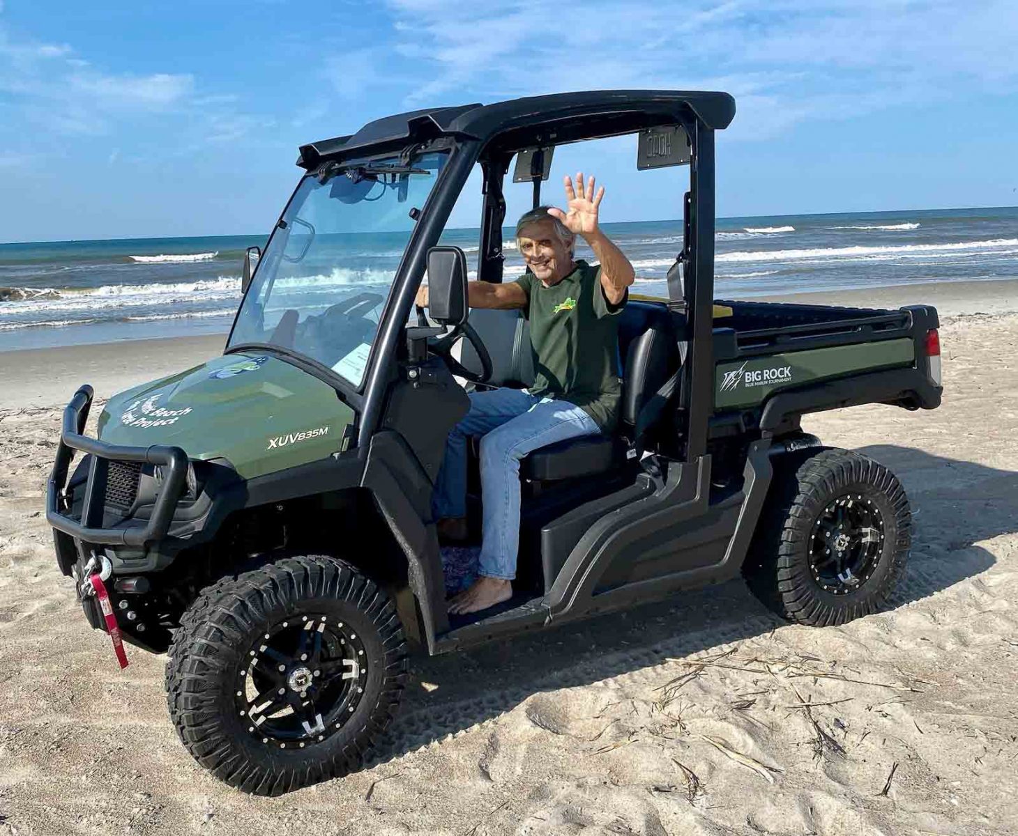 An ABSTP volunteer driving a UTV on the beach.